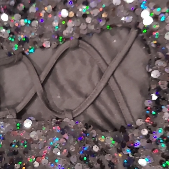 Black sleeveless mini dress with sequins and a form-fitting design - Picture 7 of 8